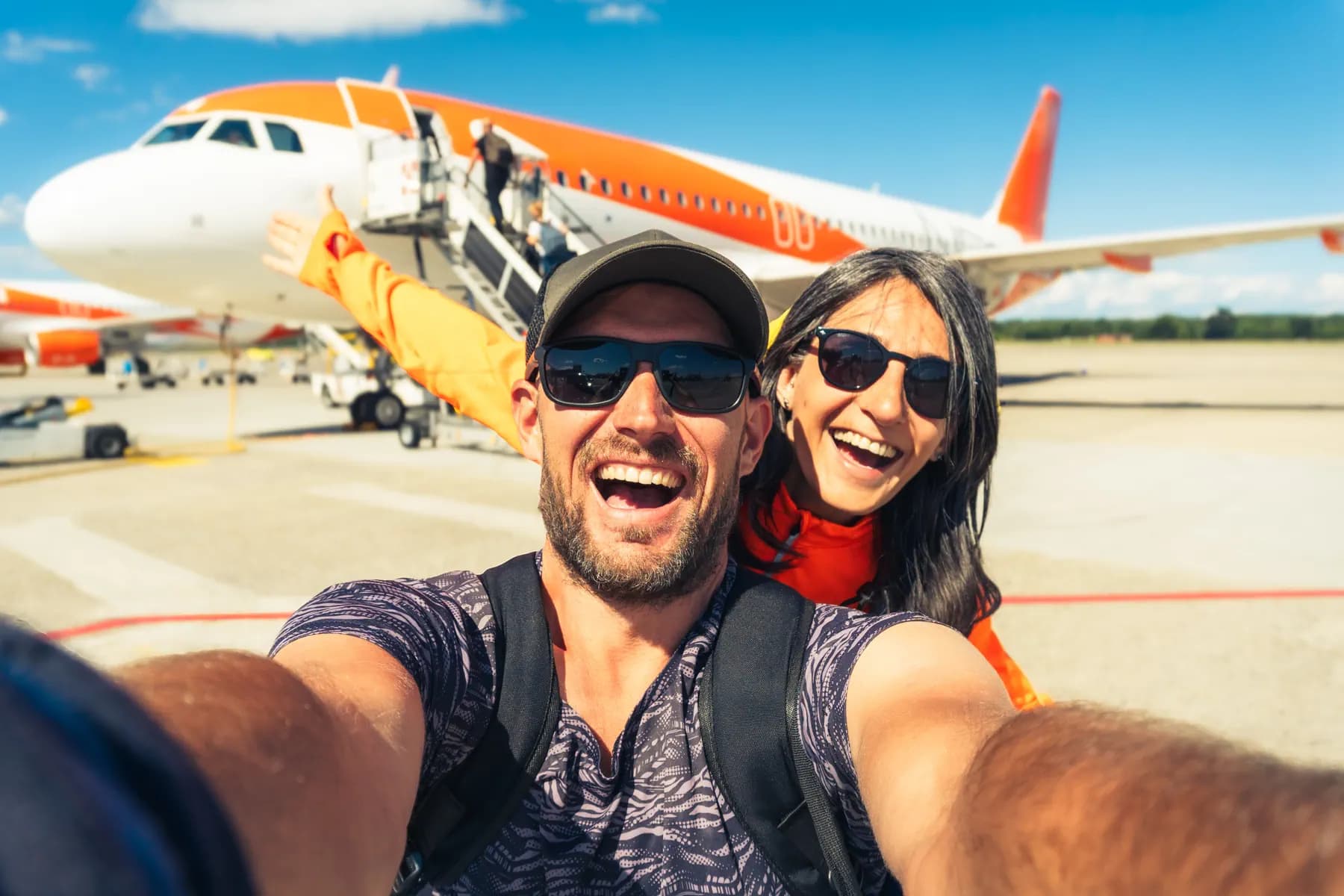 Happy couple traveling together